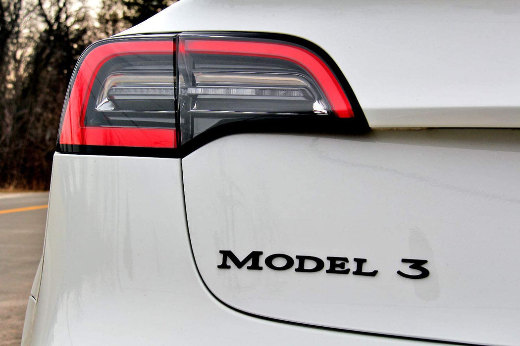 Tesla modell 3 emblem