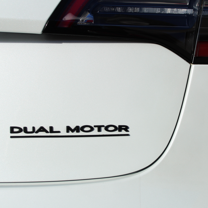 Tesla model Dual motor emblem